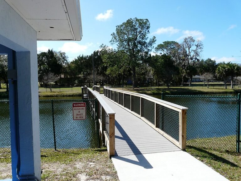 Boardwalk fishing pier extending over Florida Gulf Coast waters — ideal for pompano fishing