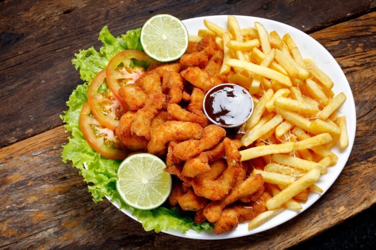 Golden fried alligator bites on a plate